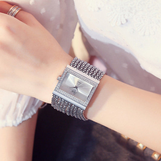 📢📢60 % de réduction ！✨Quartz élégant avec strass & bracelet à pompons : cadeau parfait pour Noël, Saint-Valentin ou anniversaire ! 💎⌚