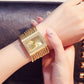 📢📢60 % de réduction ！✨Quartz élégant avec strass & bracelet à pompons : cadeau parfait pour Noël, Saint-Valentin ou anniversaire ! 💎⌚