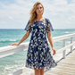 💎 50% DE RÉDUCTION ! 💎 Robe de Soirée Trapèze à Manches Courtes – Imprimé Floral Élégant, Double Couche en Mousseline & Coupe Flatteuse au Genou 👗💙