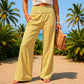 Pantalon pour femme à taille froncée et motif vichy rayé
